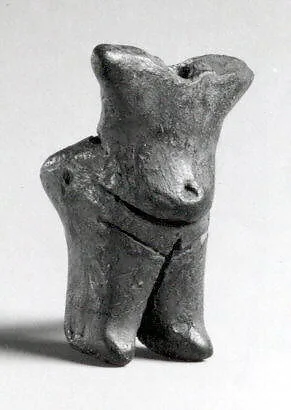 Standing female (with a hole for attachment of the head, now missing) — Unknown
