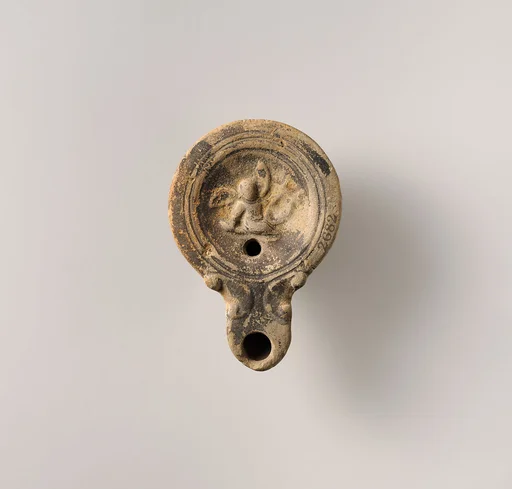 Terracotta oil lamp