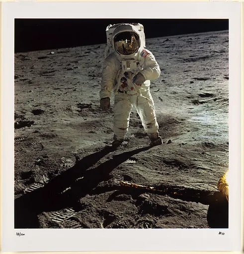 Buzz Aldrin Walking on the Surface of the Moon Near a Leg of the Lunar Module