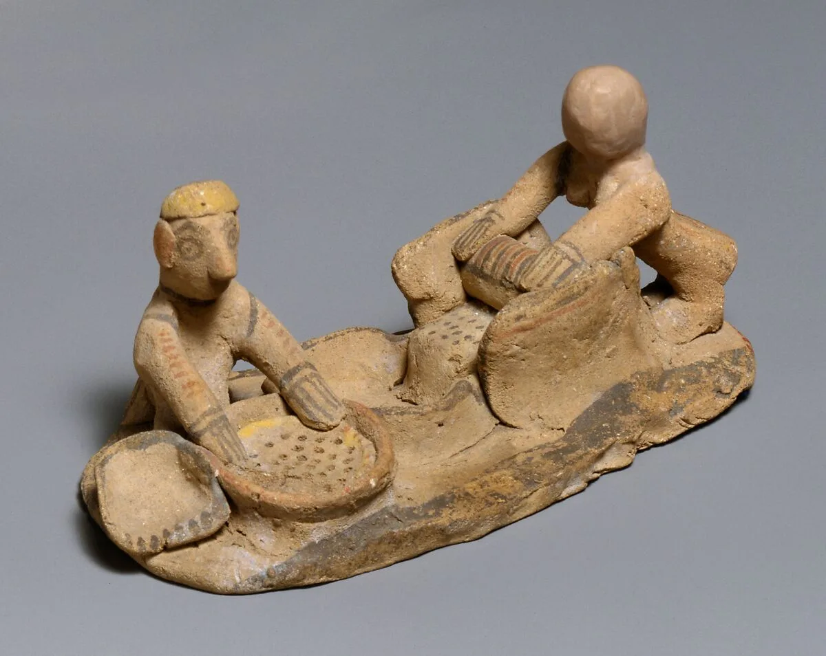 Terracotta group: making flour — Unknown