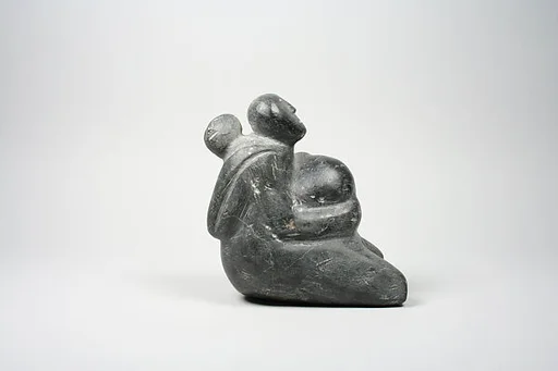Mother & Child in Hood and Nursing at Breast