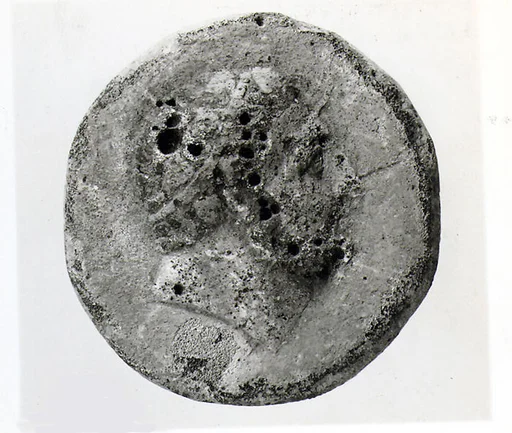 Glass roundel with head of Herakles
