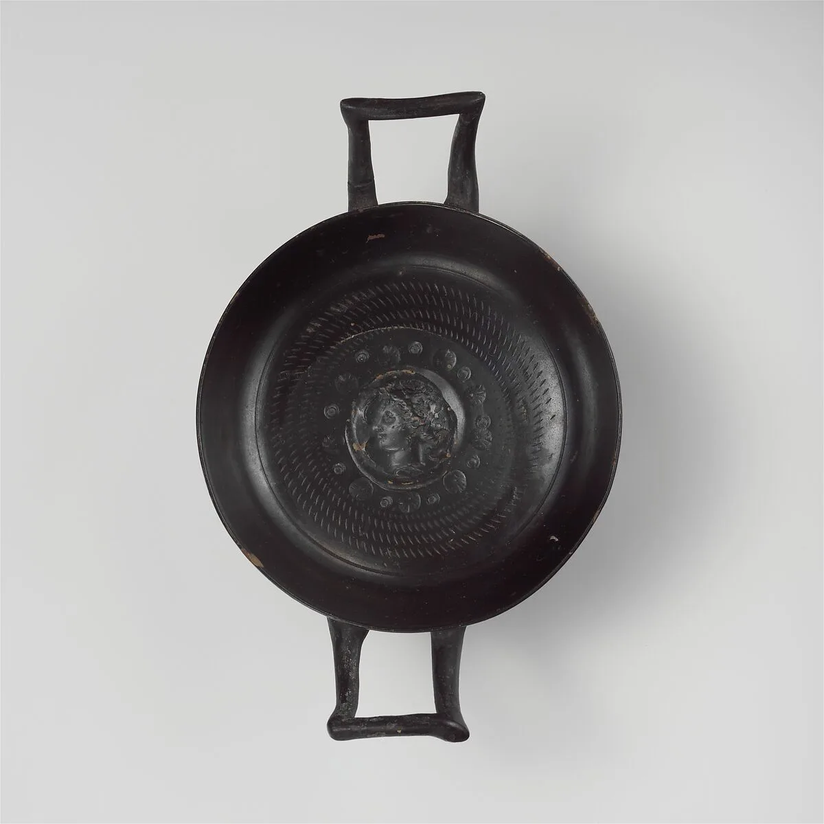 Terracotta stemless kylix (drinking cup) — Unknown