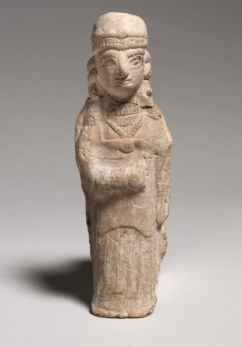 Standing female figurine — Unknown