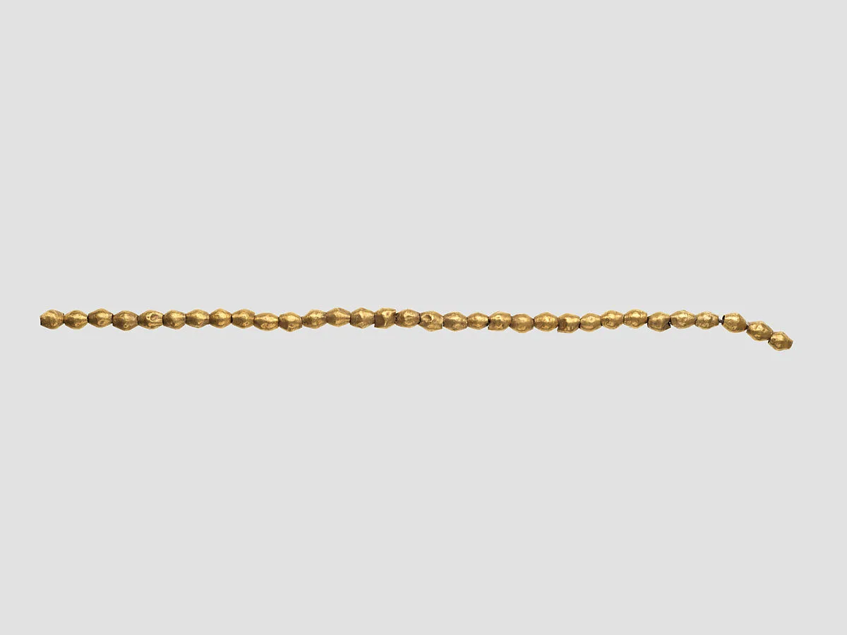 Necklace pendants and beads — Unknown