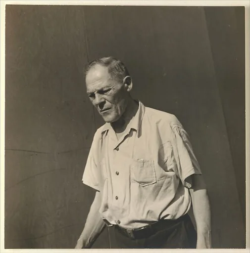 [Male Pedestrian in Short Sleeve Shirt, Looking Down, Detroit (for Fortune Magazine Article "Labor Anonymous")]