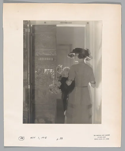 [Model wearing Chéruit afternoon dress]