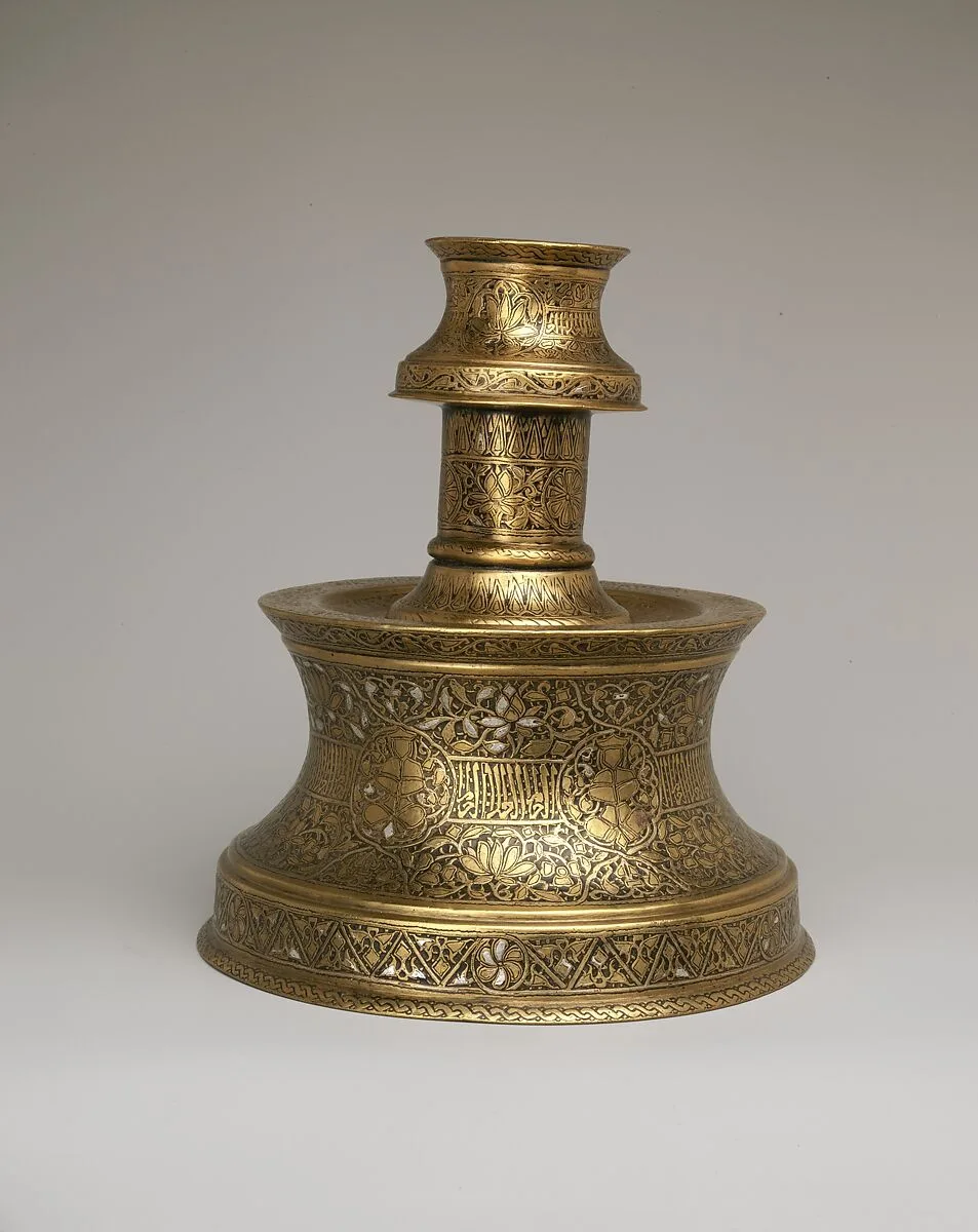 Candlestick with Repeating Seated Figure, Inscription, and Flowers — Unknown