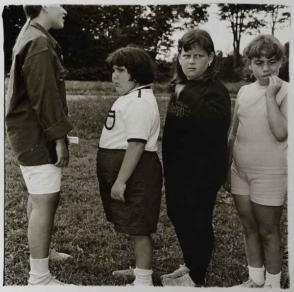 Girls standing in a line at Camp Lakecrest, Dutchess County, N.Y. — Diane Arbus|Neil Selkirk