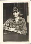 [Georgette Maury Seated with Open Book]