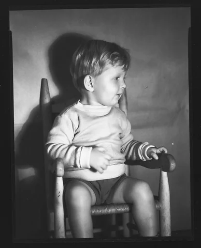 [Baby in High Chair]