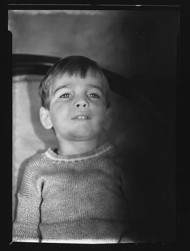 [Unidentified Child Wearing Sweater]