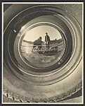 [Reflection in Chrysler Hubcap]