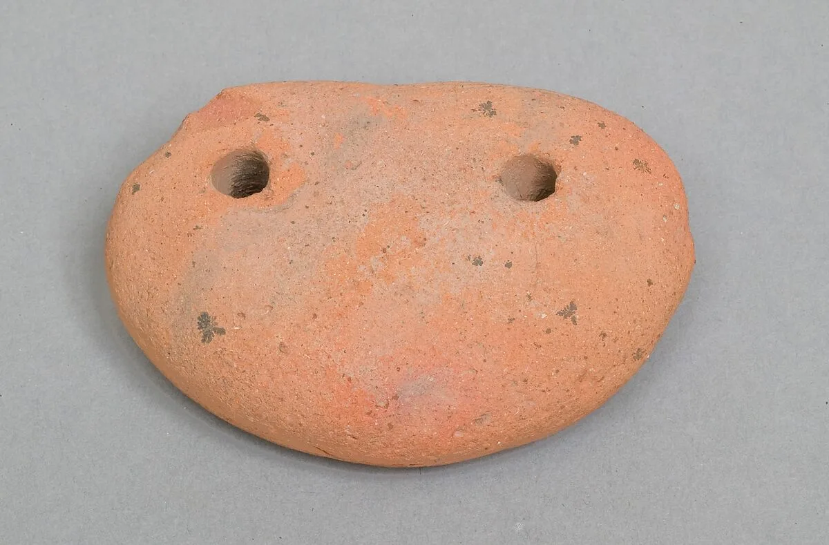 Weighing down device (fish net sinker?) — Unknown