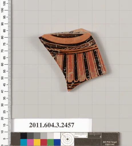 Terracotta fragment of a kylix (drinking cup)