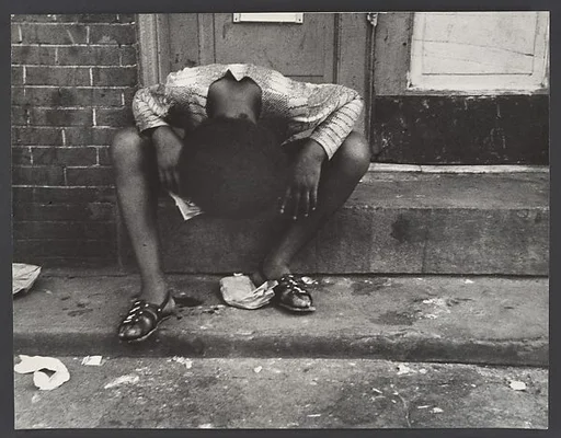 [Street Scene: Exhausted Woman with Head Between Knees, New York City]