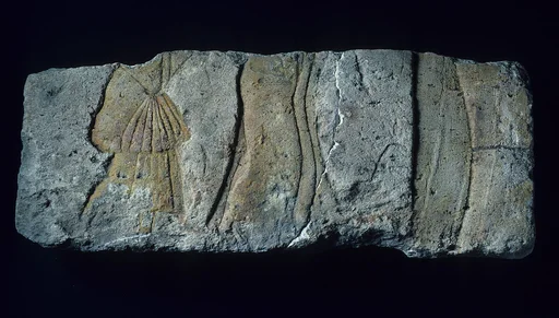 Relief with royal person and courtiers