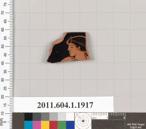 Terracotta rim fragment of a kylix (drinking cup)