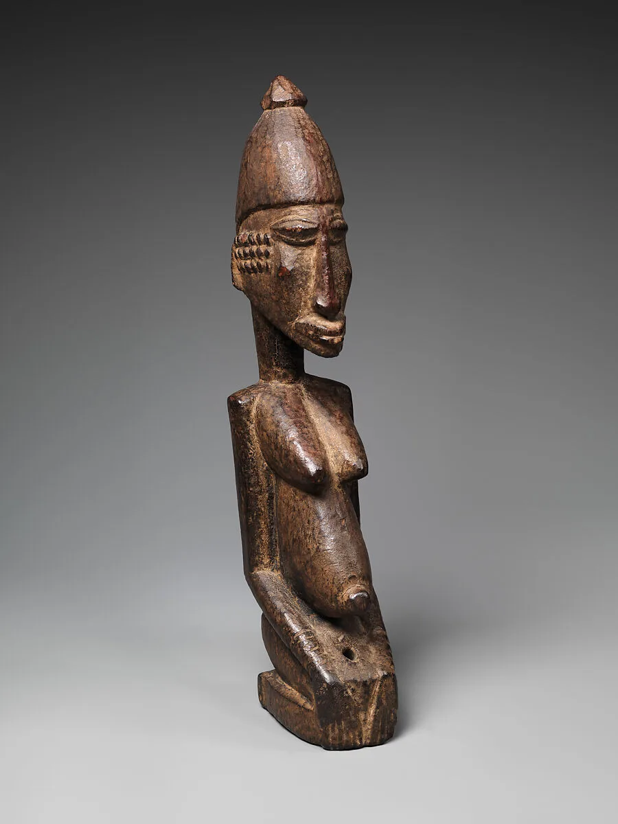 Figure of a Kneeling Woman — Unknown