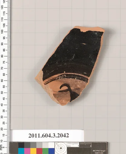 Terracotta fragment of a kylix (drinking cup)