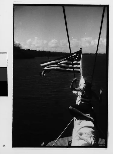 [Five 35mm Film Frames: South Seas: Isabelle Jennings Seated on Cressida Prow, Unidentified Man on Cressida Deck, and Steamship F. H. Bedford Jr.]