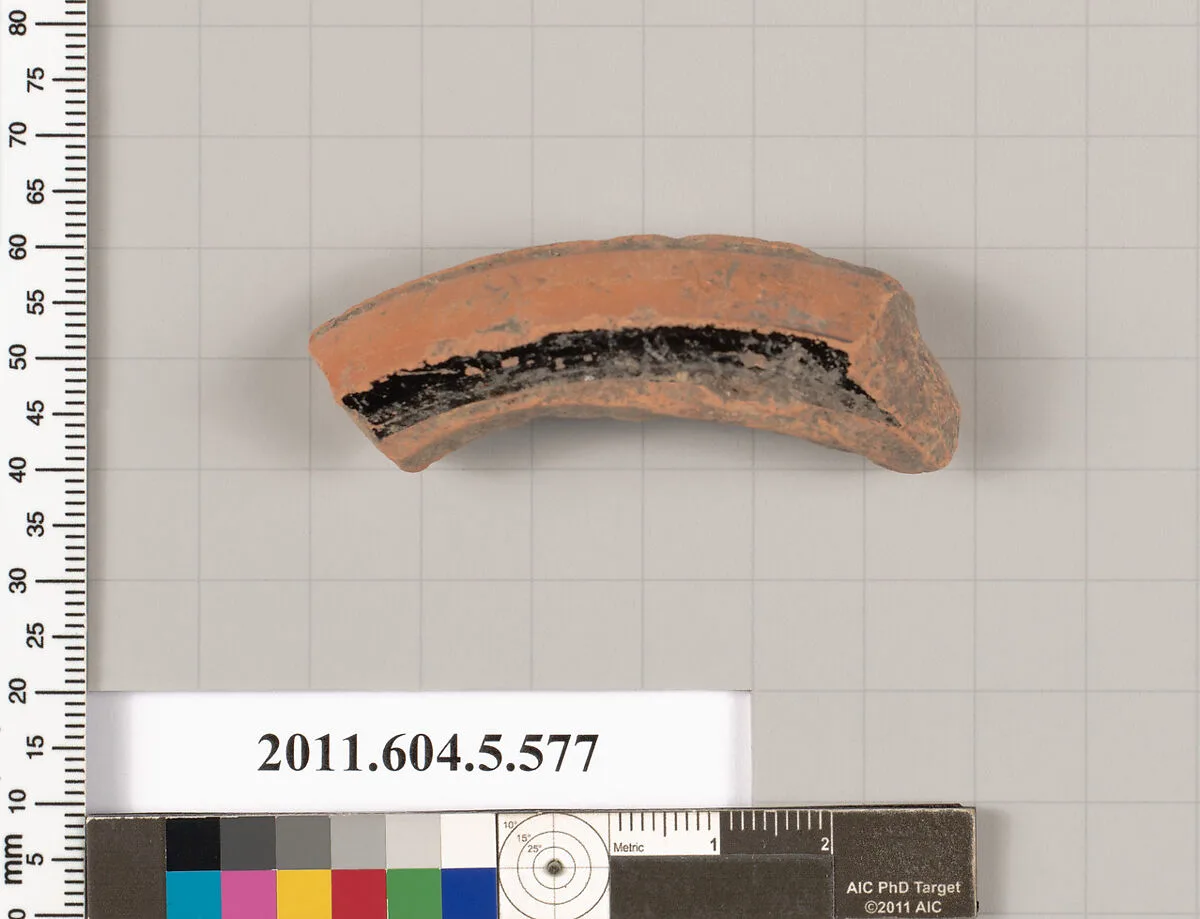 Terracotta fragment of a stemless kylix (drinking cup)? — Unknown
