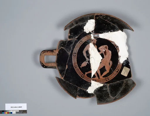 Terracotta fragment of a kylix (drinking cup)