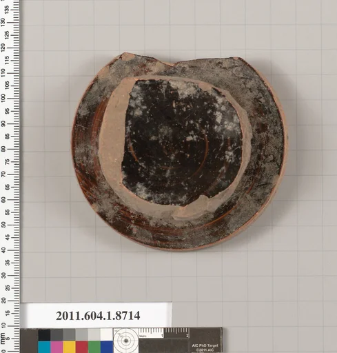 Terracotta fragment of a kylix (drinking cup)