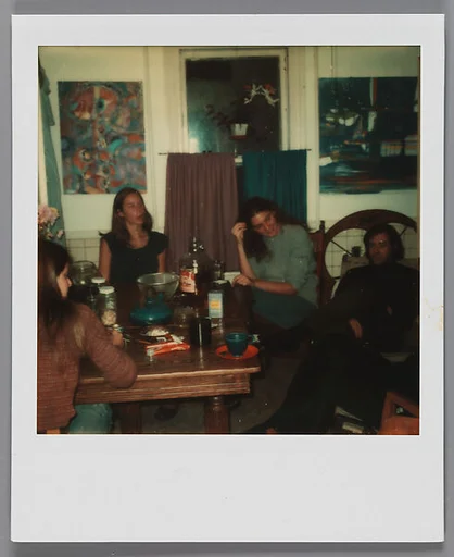 [Marcia Due, Liz Lesy, and Jerry Thompson and Laura Geringer at Kitchen Table]