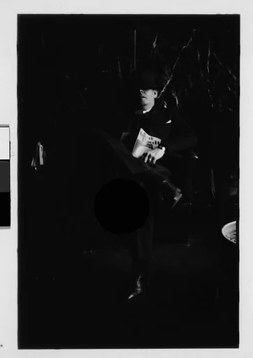 [Four 35mm Film Frames: Man Asleep in Armchair with Magazine in Lap, Movie Posters, Pennsylvania]