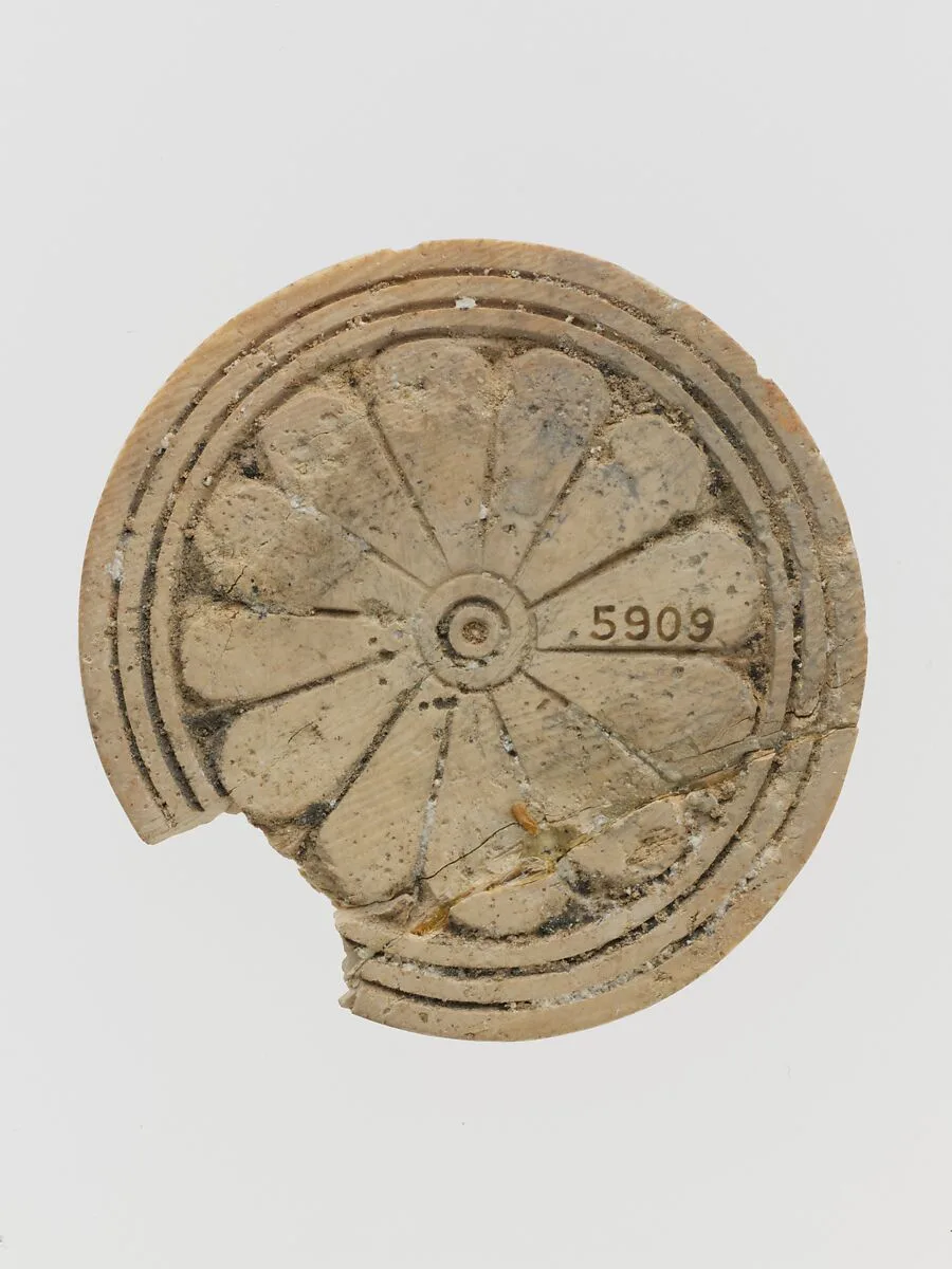 Ivory disk with rosette — Unknown
