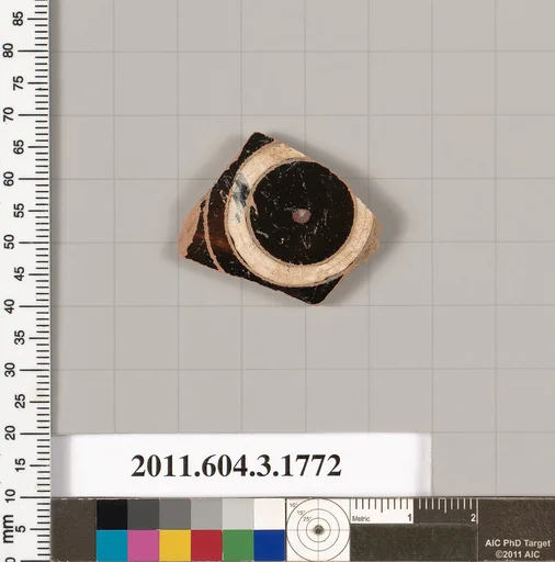 Terracotta fragment of a kylix: Band cup (drinking cup)