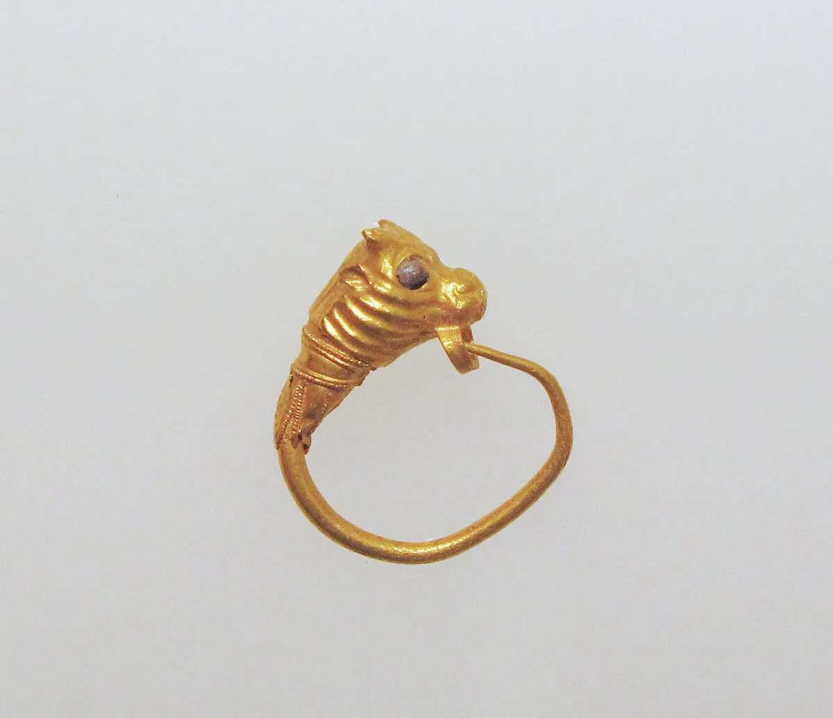 Gold earring with head of a bull — Unknown