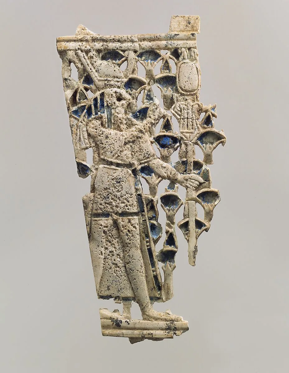 Openwork furniture plaque with a falcon-headed figure in a papyrus thicket — Unknown