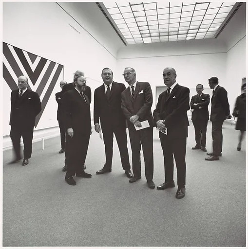 [Henry Geldzhaler in the Galleries with Visitors]
