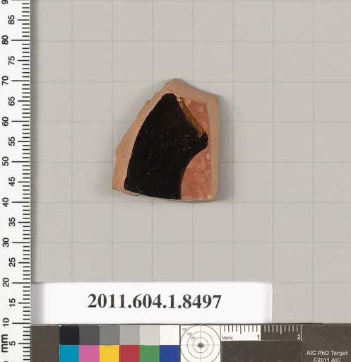 Terracotta fragment of a stemless kylix (drinking cup)