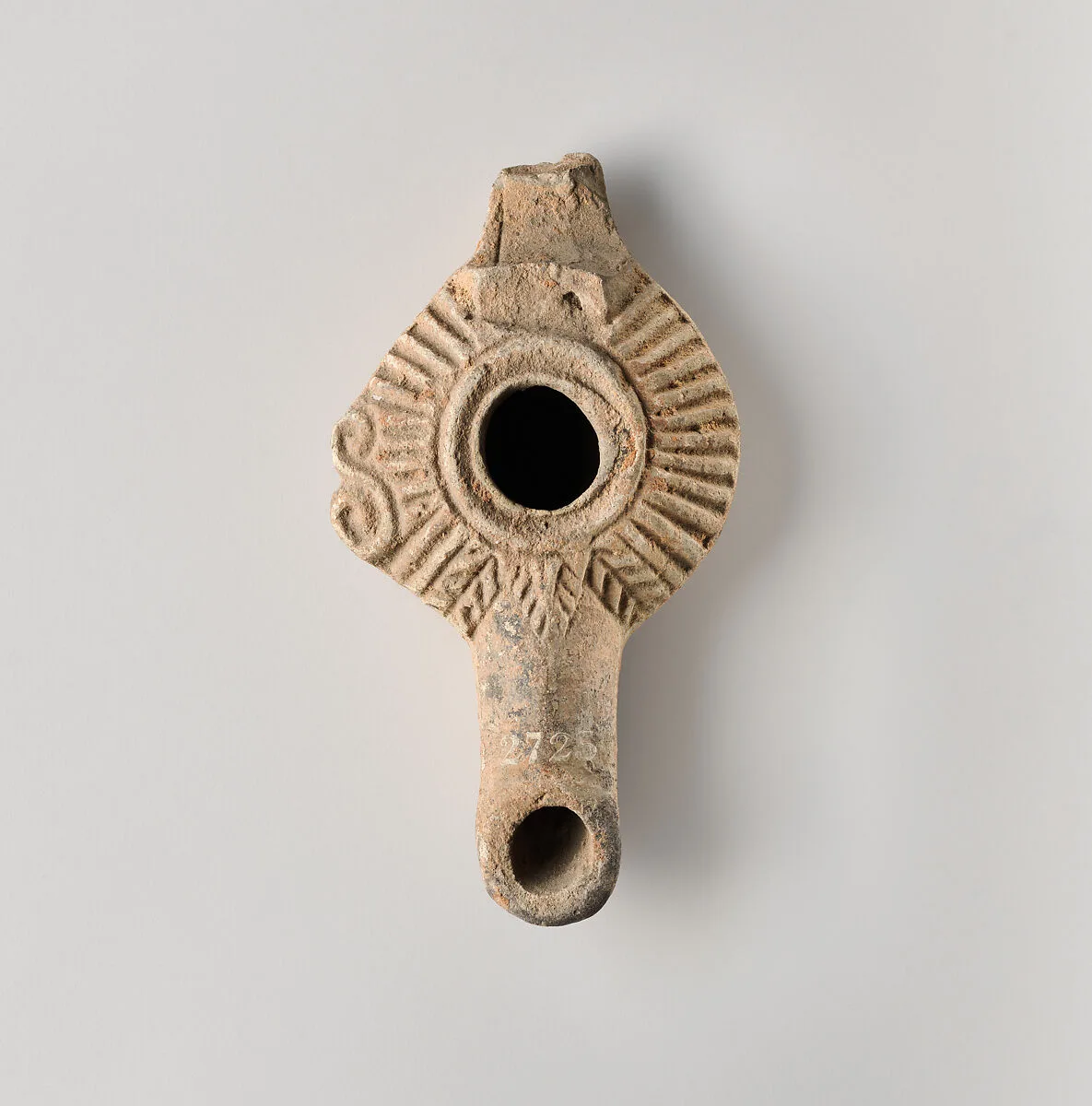 Terracotta oil lamp — Unknown