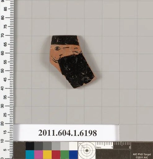 Terracotta rim fragment of a kylix (drinking cup)