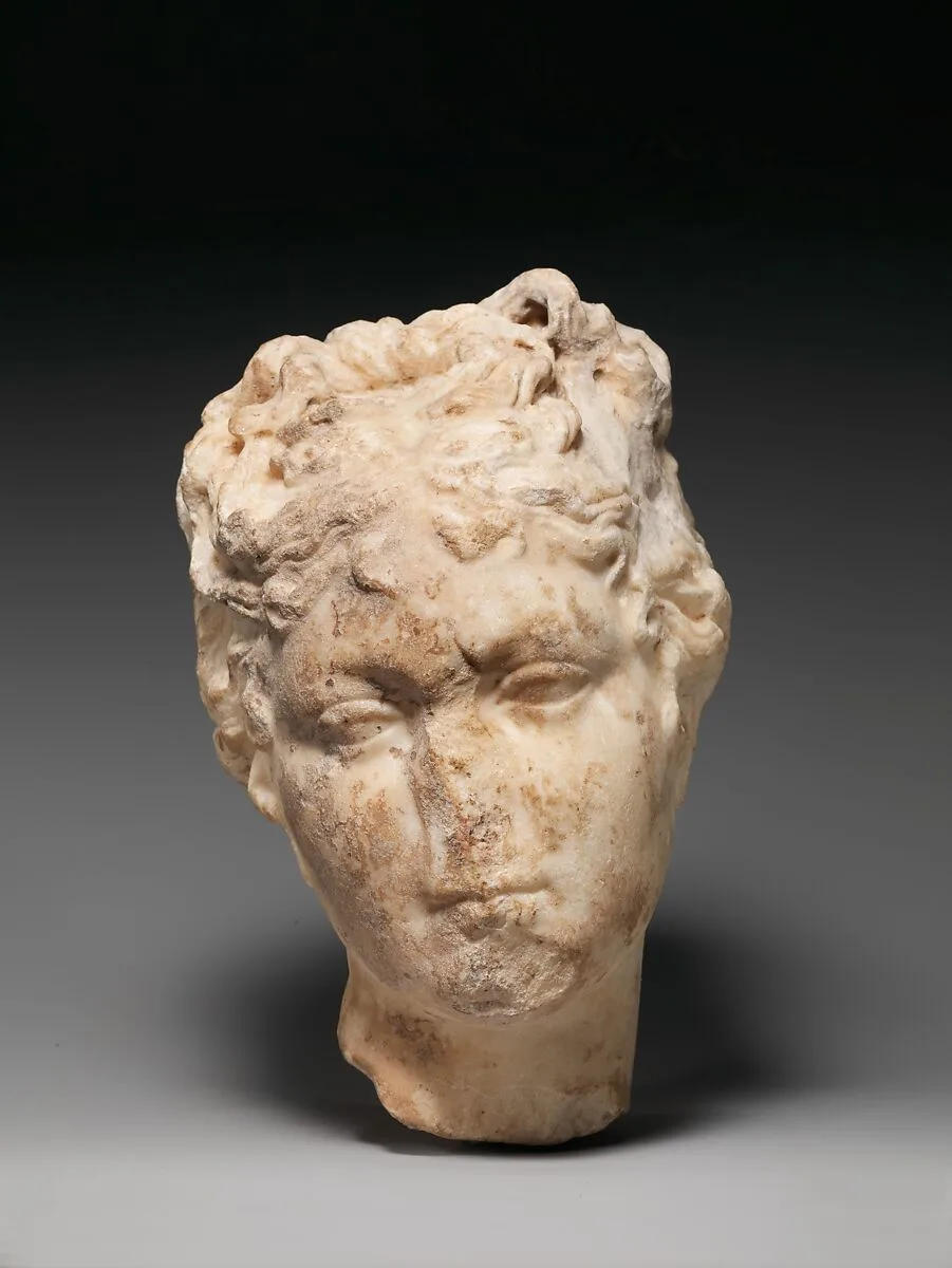 Marble head of a young woman — Unknown