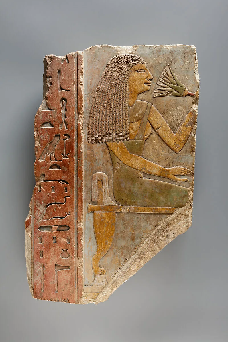 Relief Showing a Seated Woman Smelling the Blossom of a Water Lily — Unknown
