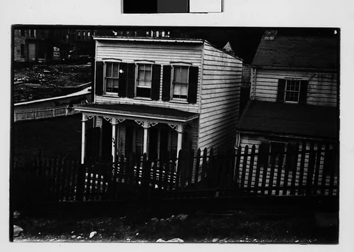 [Three 35mm Film Frames: Frame House Behind Fence on Sloping Street, Ossining, New York]
