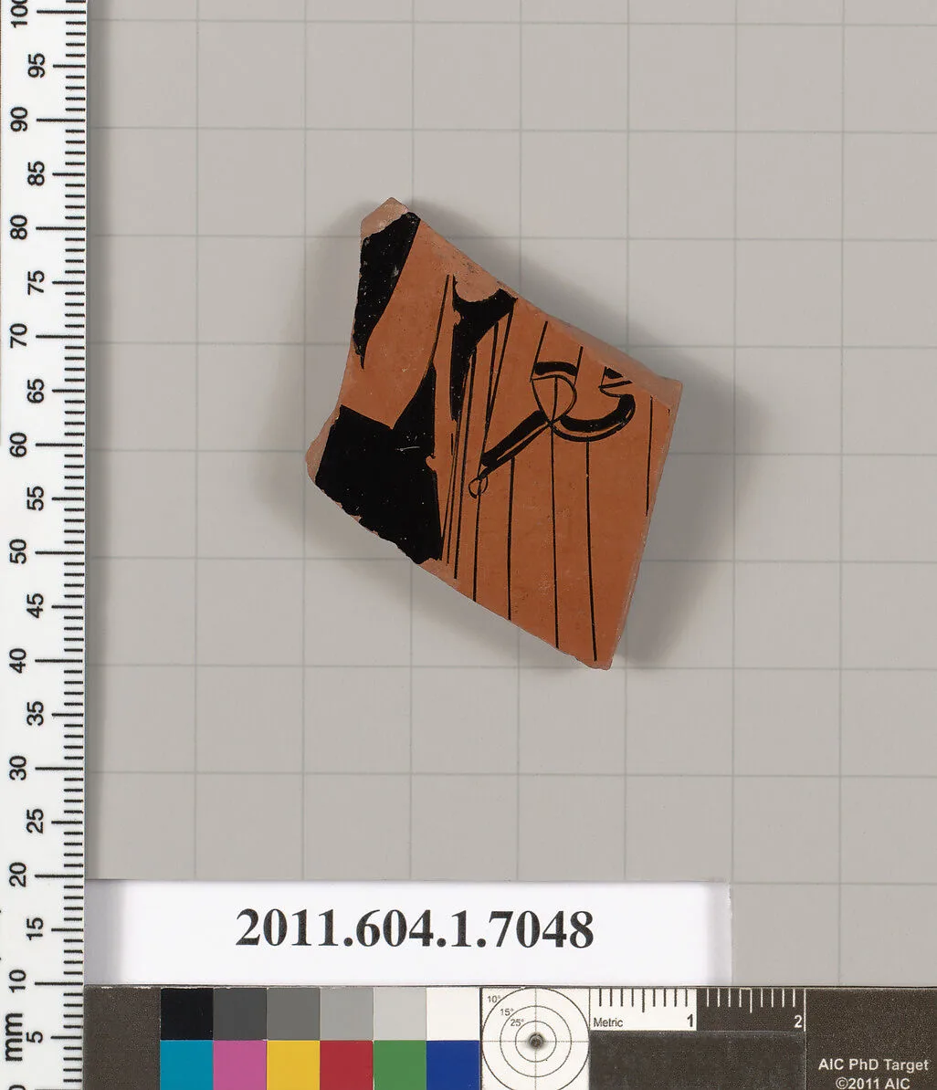 Terracotta fragment of a kylix (drinking cup) — Douris