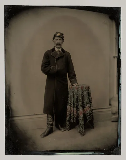 [Union Civil War Soldier, in Studio, Standing by Table]