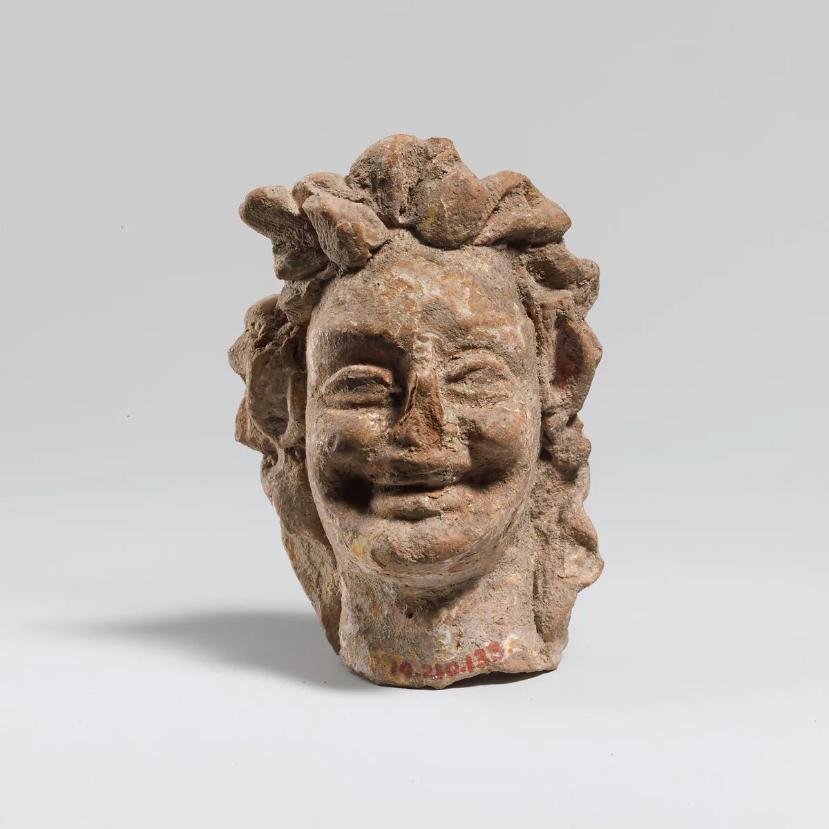 Terracotta head of a laughing satyr — Unknown