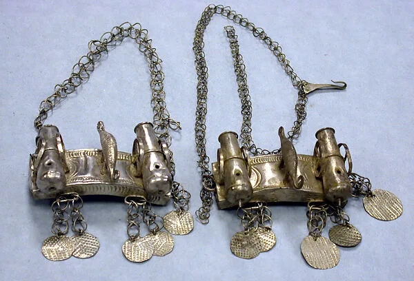 Arm Bands: Chameleon and Gun Motif with Pendants — Unknown