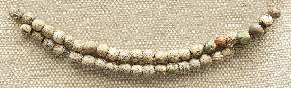 String of 7 Beads — Unknown