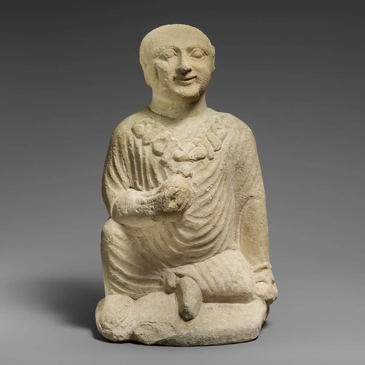 Limestone statuette of a temple boy — Unknown