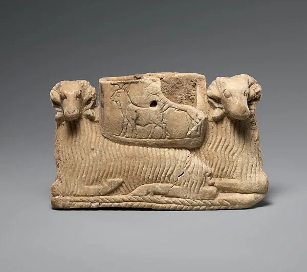 Vessel supported by two rams — Unknown