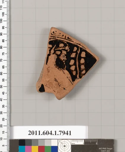 Terracotta fragment of a kylix (drinking cup)