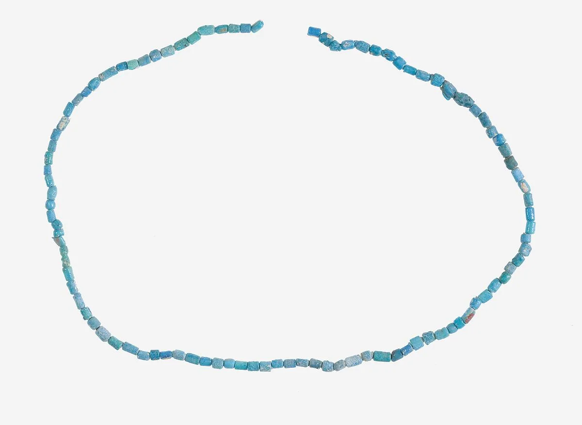 String of Short Cylindrical Beads — Unknown